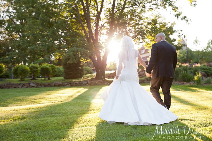 Bride and Groom walking into the light