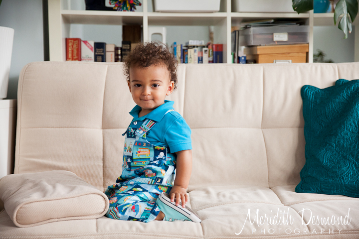 Boy sitting on modern couch